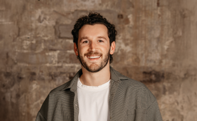 A portrait of Olly Hoffman